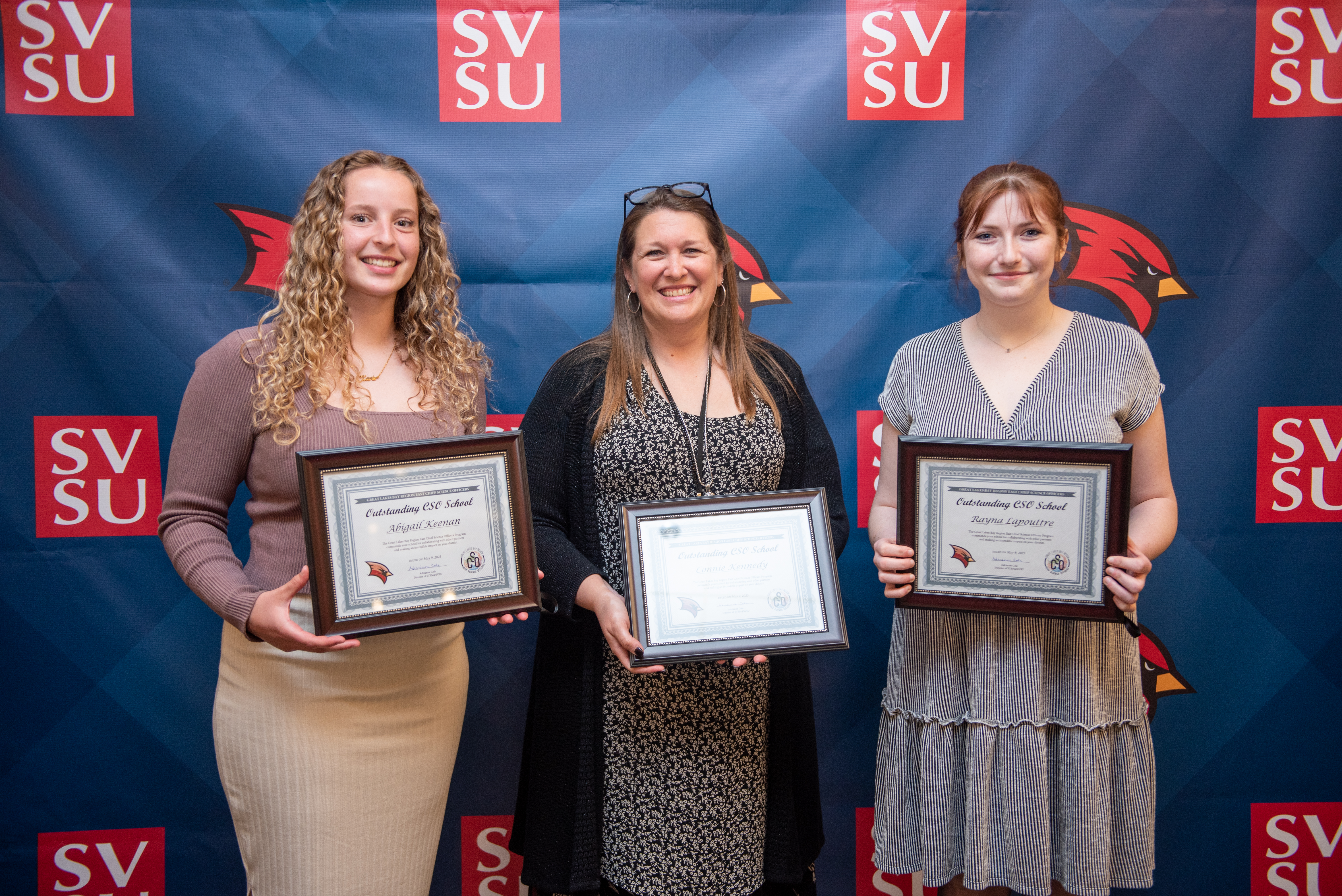 CSO Advisor and Students with their awards